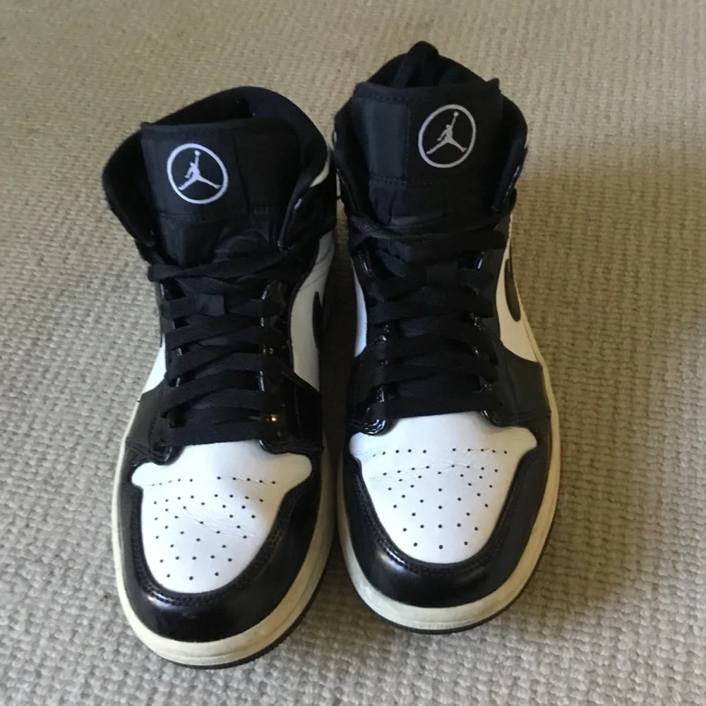 Jordan Black and White High-Top Sneakers